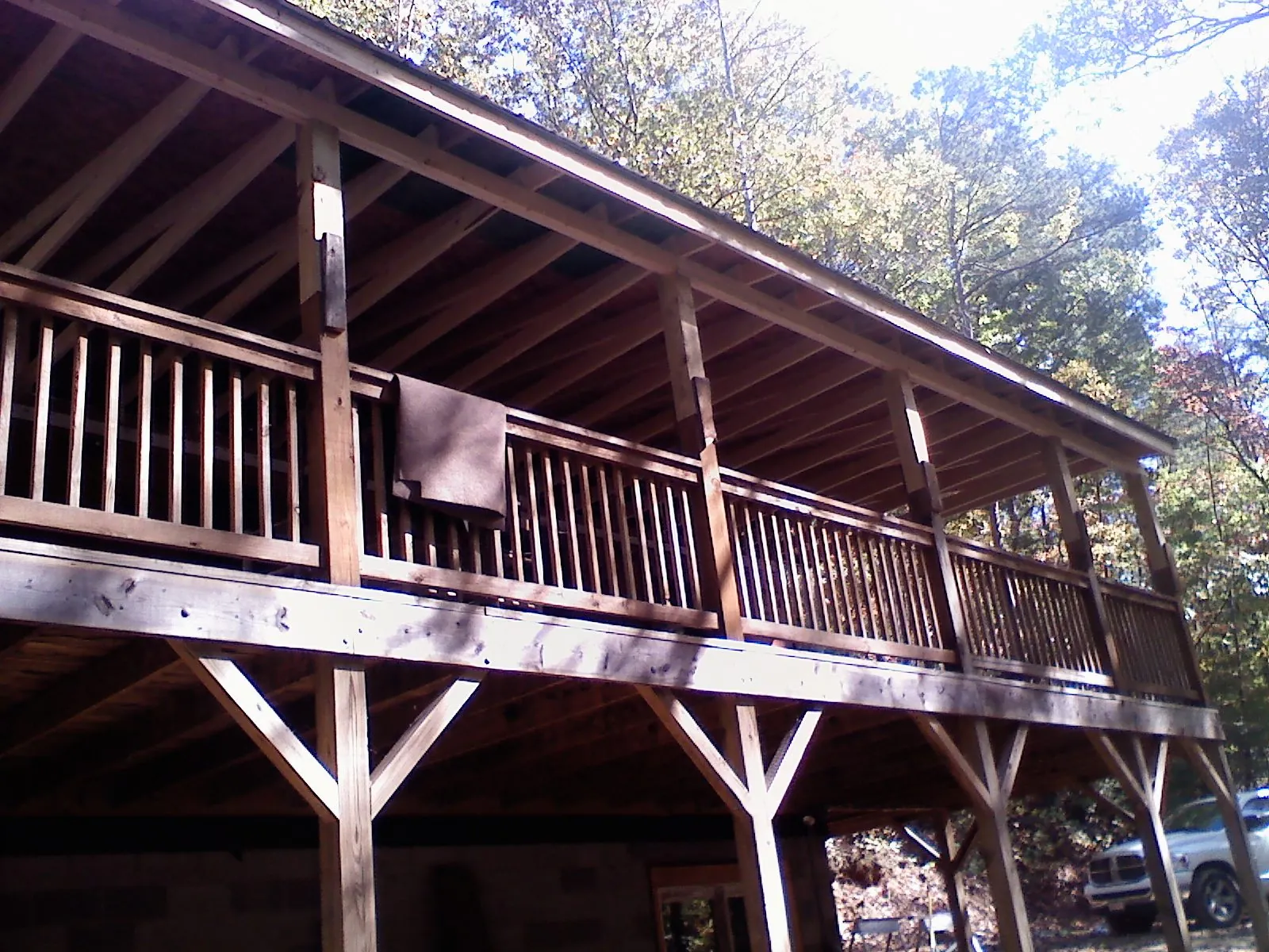 Timber framing under a new elevated porch and deck — Roof Leak Repair in Leavenworth by Roofing Brothers